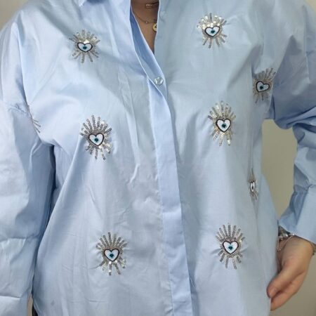 Camisa azul  Bebé Overize con  brillantes en forma de ojo