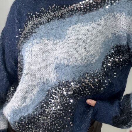 Jersey de punto azul con aguas y brillantes